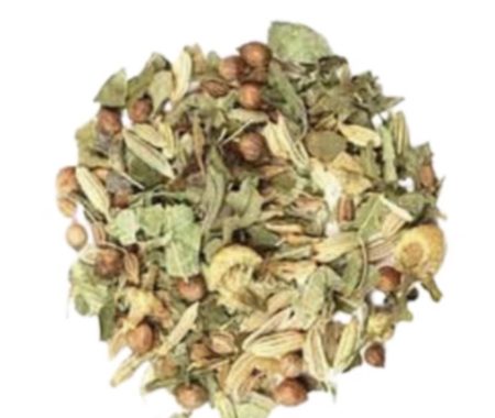Wellness herb blend with fennel seed, coriander, chamomile, and mint leaves at SereniTea Boutique