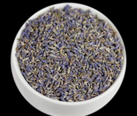 Fragrant dried lavender buds in a white bowl at SereniTea Boutique